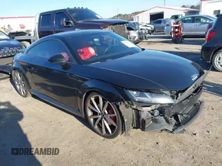 2017 Audi TTS with VIN TRUC1AFV9H1013618, listed as a IAAI auction lot 41599362 with 92,184 mi miles and . Bid and sale history available at DreamBid. Image 1.
