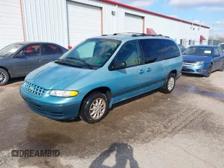 1998 Plymouth Voyager Grand SE z VIN 2P4GP44G4WR654454, wystawiony jako IAAI lot #41736791 z przebiegiem 80 000 mil mil oraz . Historia ofert i sprzedaży dostępna na DreamBid. Obrazek 2.