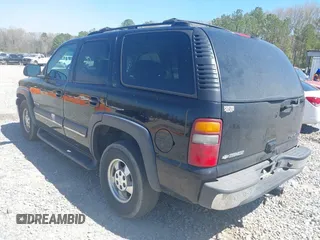 2002 Chevrolet Tahoe LT z VIN 1GNEC13Z42R245581, wystawiony jako IAAI lot #41810788 z przebiegiem 228 166 mil mil oraz . Historia ofert i sprzedaży dostępna na DreamBid. Obrazek 3.