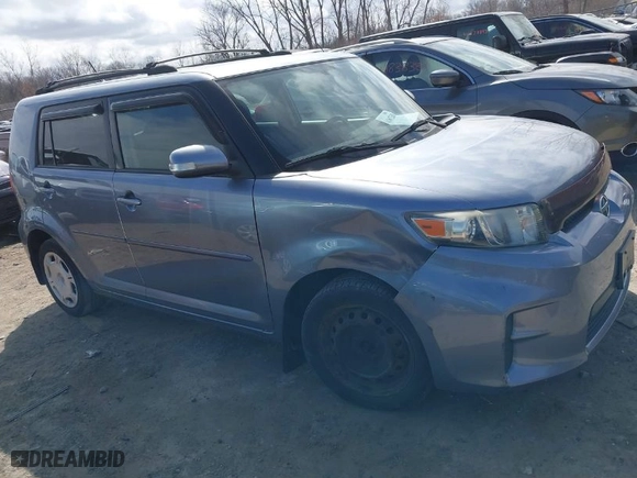 2012 Scion xB with VIN JTLZE4FE2CJ022796, listed as a IAAI auction lot 41867520 with 166,371 mi miles. Bid and sale history available at carsss.com. Image 13.