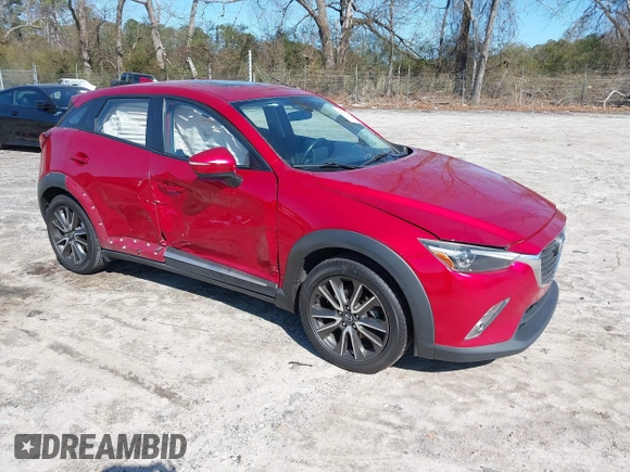2016 Mazda CX-3 Grand Touring with VIN JM1DKFD72G0129096, listed as a IAAI auction lot 41592893 with 144,860 mi miles. Bid and sale history available at carsss.com. Image 1.