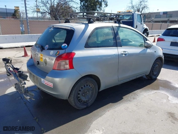2007 Toyota Yaris with VIN JTDJT923175050104, listed as a IAAI auction lot 41818704 with 467,292 mi miles. Bid and sale history available at carsss.com. Image 4.