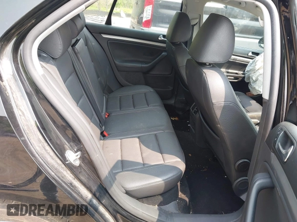 2009 Volkswagen Jetta SE with VIN 3VWRZ71K29M078499, listed as a IAAI auction lot 42399407 with 124,484 mi miles and . Bid and sale history available at DreamBid. Image 8.