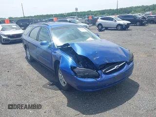 2003 Ford Taurus SE Standard z VIN 1FAFP58U93A171652, wystawiony jako IAAI lot #42314064 z przebiegiem 116 697 mil mil oraz . Historia ofert i sprzedaży dostępna na DreamBid. Obrazek 1.