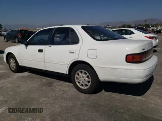 1992 Toyota Camry LE with VIN 4T1SK12E0NU077223, listed as a Copart auction lot 71787194 with 239,027 mi miles and Salvage Title. Bid and sale history available at carsss.com. Image 2.