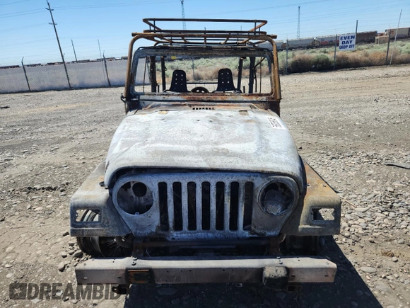 2000 Jeep Wrangler SE with VIN 1J4FA29P2YP797531, listed as a Copart auction lot 56058845 with Not provided miles and Salvage title. Bid and sale history available at DreamBid. Image 5.