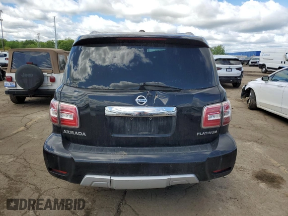 2017 Nissan Armada Platinum z VIN JN8AY2NCXH9504904, wystawiony jako Copart lot #58023935 z przebiegiem Nie podano mil oraz Szkoda całkowita • Salvage title. Historia ofert i sprzedaży dostępna na DreamBid. Obrazek 6.