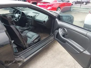 2000 Pontiac Firebird Formula z VIN 2G2FV22G1Y2104657, wystawiony jako IAAI lot #41510589 z przebiegiem Nie podano mil oraz . Historia ofert i sprzedaży dostępna na DreamBid. Obrazek 17.