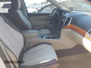 2011 Jeep Grand Cherokee Overland Summit with VIN 1J4RR6GT9BC546825, listed as a IAAI auction lot 42118789 with 123,449 mi miles. Bid and sale history available at carsss.com. Image 5.