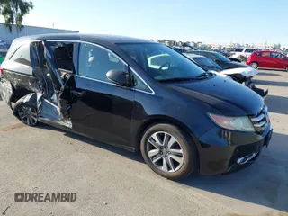 2015 Honda Odyssey Touring Elite with VIN 5FNRL5H93FB065594, listed as a IAAI auction lot 41826693 with 94,632 mi miles and . Bid and sale history available at DreamBid. Image 1.
