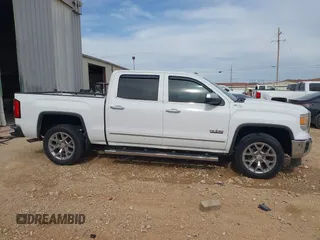 2015 GMC Sierra 1500 SLT with VIN 3GTU2VEC2FG517994, listed as a IAAI auction lot 41786021 with 116,902 mi miles and . Bid and sale history available at DreamBid. Image 13.