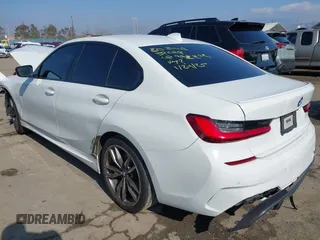 2020 BMW 3 Series M340i with VIN 3MW5U7J03L8B43176, listed as a IAAI auction lot 41450902 with 61,118 mi miles. Bid and sale history available at carsss.com. Image 3.