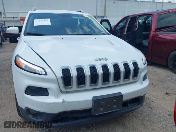 2018 Jeep Cherokee Latitude Plus with VIN 1C4PJLLBXJD590695, listed as a IAAI auction lot 39653845 with 76,667 mi miles and . Bid and sale history available at DreamBid. Image 12.