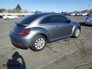 2019 Volkswagen Beetle S with VIN 3VWFD7AT2KM711440, listed as a Copart auction lot 79938914 with 94,790 mi miles and Salvage Title. Bid and sale history available at carsss.com. Image 3.