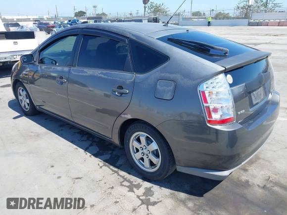 2007 Toyota Prius with VIN JTDKB20U073272767, listed as a IAAI auction lot 42520125 with 290,808 mi miles and . Bid and sale history available at DreamBid. Image 3.