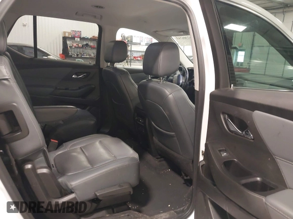 2021 Chevrolet Traverse Premier with VIN 1GNEVKKW7MJ218772, listed as a IAAI auction lot 42306743 with 106,898 mi miles and . Bid and sale history available at DreamBid. Image 8.
