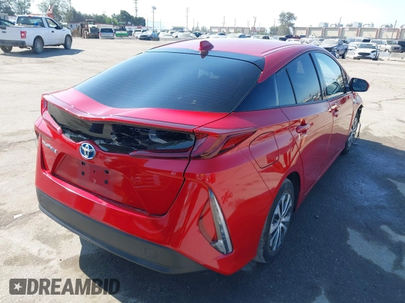 2020 Toyota Prius LE with VIN JTDKARFP8L3154280, listed as a IAAI auction lot 42405444 with 57,134 mi miles and . Bid and sale history available at DreamBid. Image 4.