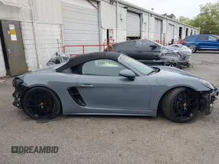 2023 Porsche 718 Spyder with VIN WP0CC2A83PS222034, listed as a IAAI auction lot 41222380 with 5,932 mi miles and . Bid and sale history available at DreamBid. Image 14.