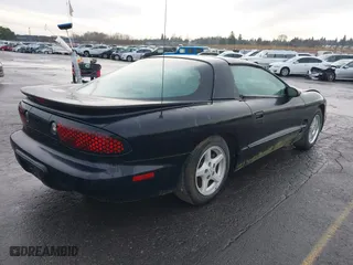 2000 Pontiac Firebird with VIN 2G2FS22K7Y2140141, listed as a IAAI auction lot 41219773 with 1 mi miles. Bid and sale history available at carsss.com. Image 4.