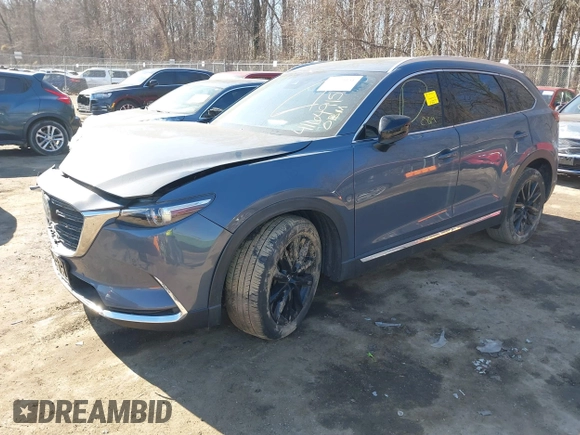 2021 Mazda CX-9 Grand Touring with VIN JM3TCBDY1M0505302, listed as a IAAI auction lot 41649151 with 67,183 mi miles and . Bid and sale history available at carsss.com. Image 17.
