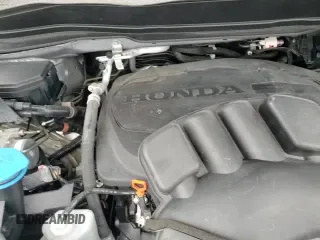 2020 Honda Pilot Touring 8-Passenger z VIN 5FNYF6H92LB010073, wystawiony jako Copart lot #89854985 z przebiegiem 28 856 mil mil oraz Szkoda całkowita • Salvage title. Historia ofert i sprzedaży dostępna na DreamBid. Obrazek 14.