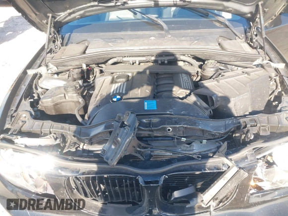 2011 BMW 1 Series 128i with VIN WBAUL7C54BVM80474, listed as a IAAI auction lot 42031032 with 76,617 mi miles and . Bid and sale history available at carsss.com. Image 10.