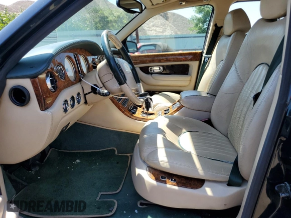 2001 Bentley Arnage with VIN SCBLC31E31CX05992, listed as a Copart auction lot 60462974 with 253,028 mi miles and Salvage Title. Bid and sale history available at DreamBid. Image 7.