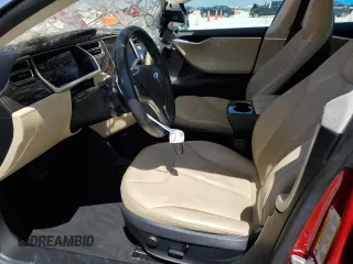 2013 Tesla Model S with VIN 5YJSA1CN1DFP26864, listed as a Copart auction lot 52029485 with 63,260 mi miles and Salvage Title. Bid and sale history available at DreamBid. Image 7.