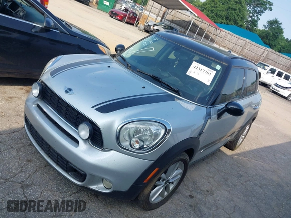 2012 MINI Countryman S z VIN WMWZC5C59CWL63348, wystawiony jako IAAI lot #42317781 z przebiegiem 132 639 mil mil oraz . Historia ofert i sprzedaży dostępna na DreamBid. Obrazek 2.