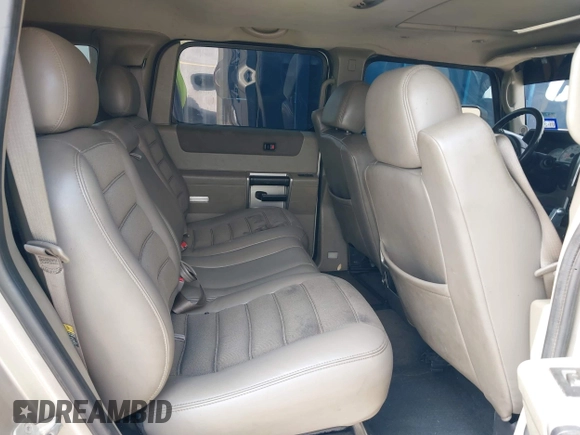 2003 Hummer H2 with VIN 5GRGN23U43H125114, listed as a IAAI auction lot 42160986 with 157,776 mi miles. Bid and sale history available at carsss.com. Image 8.