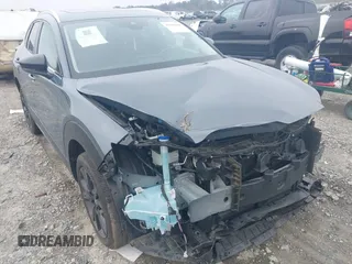 2023 Mazda CX-30 S Carbon Edition with VIN 3MVDMBCM5PM514304, listed as a IAAI auction lot 41795899 with 31,993 mi miles and . Bid and sale history available at DreamBid. Image 6.