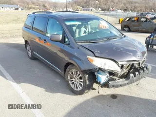 2013 Toyota Sienna XLE AAS with VIN 5TDYK3DC1DS396526, listed as a IAAI auction lot 41734256 with 218,723 mi miles. Bid and sale history available at carsss.com. Image 1.