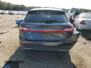 2018 Lincoln MKX Premiere z VIN 2LMPJ8JR7JBL38566, wystawiony jako Copart lot #70669944 z przebiegiem 69 860 mil mil oraz Szkoda całkowita • Salvage title. Historia ofert i sprzedaży dostępna na DreamBid. Obrazek 6.