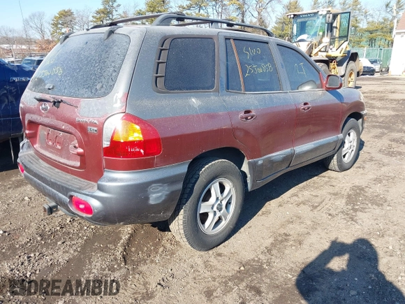2004 Hyundai Santa Fe GLS with VIN KM8SC13E34U708007, listed as a IAAI auction lot 41414729 with 999,999 mi miles. Bid and sale history available at carsss.com. Image 4.