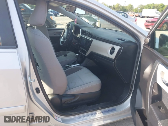 2018 Toyota Corolla L with VIN 2T1BURHE6JC100175, listed as a IAAI auction lot 42405737 with 123,183 mi miles and . Bid and sale history available at DreamBid. Image 5.