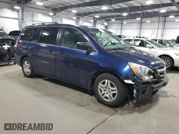 2005 Honda Odyssey EX-L with VIN 5FNRL38625B024415, listed as a Copart auction lot 52380955 with 182,660 mi miles and Salvage Title. Bid and sale history available at carsss.com. Image 4.