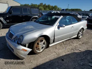 2002 Mercedes-Benz CLK with VIN WDBLK70GX2T106873, listed as a Copart auction lot 71202824 with 140,233 mi miles and Salvage Title. Bid and sale history available at carsss.com. Image 1.