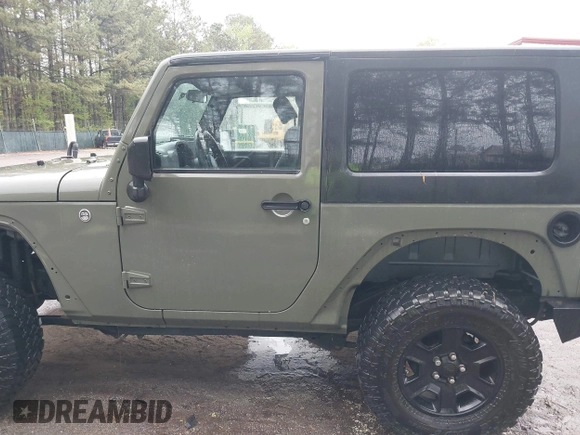 2007 Jeep Wrangler X with VIN 1J4FA24127L231409, listed as a IAAI auction lot 41971429 with 181,855 mi miles and . Bid and sale history available at carsss.com. Image 14.