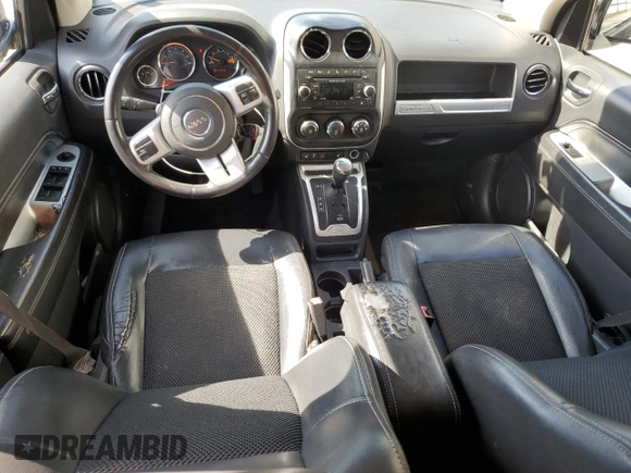 2016 Jeep Compass Latitude z VIN 1C4NJCEA2GD620485, wystawiony jako Copart lot #60089415 z przebiegiem 194 758 mil mil oraz Szkoda całkowita • Salvage title. Historia ofert i sprzedaży dostępna na DreamBid. Obrazek 8.