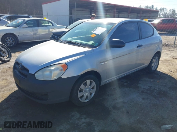 2007 Hyundai Accent GS with VIN KMHCM36C97U043769, listed as a IAAI auction lot 41526011 with 230,566 mi miles. Bid and sale history available at carsss.com. Image 17.