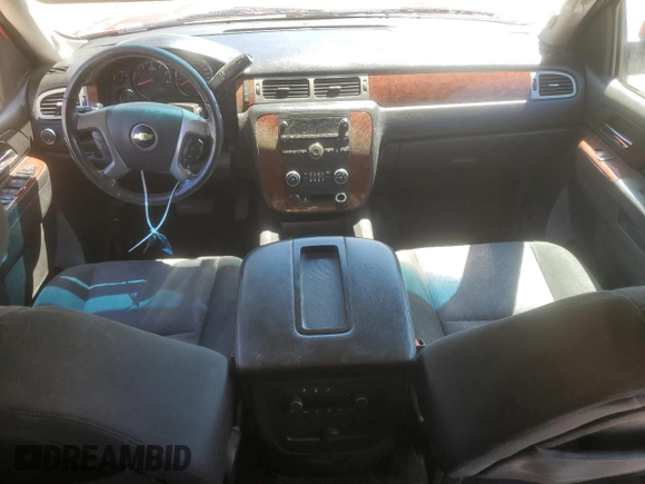 2012 Chevrolet Tahoe LS with VIN 1GNSCAE02CR319700, listed as a Copart auction lot 50321735 with 180,403 mi miles and Salvage title. Bid and sale history available at DreamBid. Image 8.