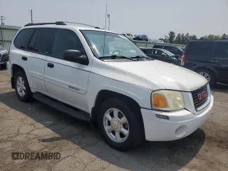 2003 GMC Envoy SLE z VIN 1GKDT13S732228585, wystawiony jako Copart lot #58764565 z przebiegiem 151 107 mil mil oraz Szkoda całkowita • Salvage title. Historia ofert i sprzedaży dostępna na DreamBid. Obrazek 4.