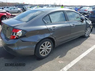 2012 Honda Civic EX-L with VIN 2HGFB2F94CH307646, listed as a IAAI auction lot 42006923 with 260,917 mi miles and . Bid and sale history available at DreamBid. Image 4.