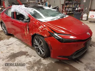 2024 Toyota Prius LE z VIN JTDADABU8R3013976, wystawiony jako IAAI lot #41621800 z przebiegiem 7475 mil mil oraz . Historia ofert i sprzedaży dostępna na DreamBid. Obrazek 1.