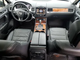 2012 Volkswagen Touareg Sport z VIN WVGFK9BP6CD005005, wystawiony jako Copart lot #46802355 z przebiegiem 141 430 mil mil oraz Czysty tytuł • Clean title. Historia ofert i sprzedaży dostępna na DreamBid. Obrazek 8.