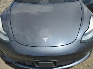 2020 Tesla Model 3 Standard Range Plus with VIN 5YJ3E1EA6LF614045, listed as a Copart auction lot 65222584 with 59,823 mi miles and Salvage Title. Bid and sale history available at DreamBid. Image 11.