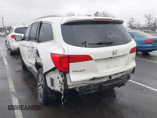 2016 Honda Pilot Touring with VIN 5FNYF6H95GB062089, listed as a IAAI auction lot 41810378 with 74,704 mi miles and . Bid and sale history available at DreamBid. Image 3.