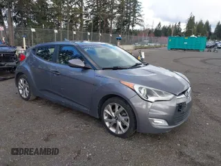 2017 Hyundai Veloster with VIN KMHTC6AD5HU305602, listed as a IAAI auction lot 41798154 with 77,488 mi miles. Bid and sale history available at carsss.com. Image 1.