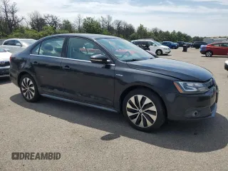 2013 Volkswagen Jetta Hybrid SE with VIN 3VW637AJXDM225219, listed as a Copart auction lot 63197905 with 97,672 mi miles and Clean title. Bid and sale history available at DreamBid. Image 4.
