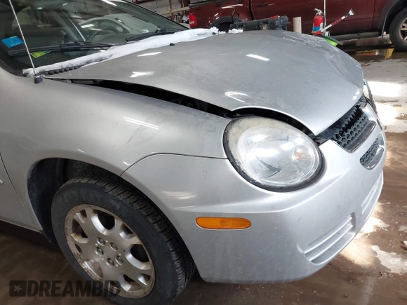 2004 Dodge Neon SXT with VIN 1B3ES56C94D593209, listed as a IAAI auction lot 41621999 with 89,698 mi miles. Bid and sale history available at carsss.com. Image 14.